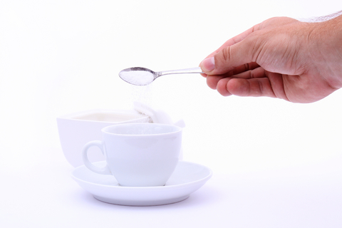 Shows someone pouring sugar into a cup of tea to illustrate this fact, that water has an incredible ability to attach to other molecules