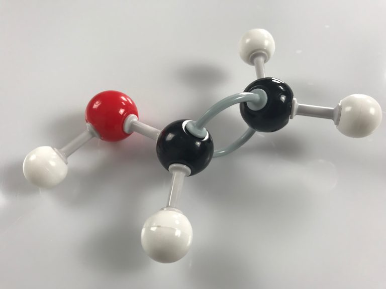 Shows a molecular model to illsutrate that slime can be educational and teach children about molecules