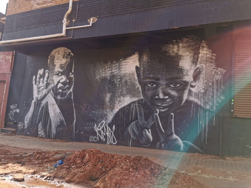 Shows grafitti in the South African township where the school is located to illustrate the topic of the articel which is "the secret to good teaching"